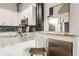 Modern kitchen featuring granite countertops, stainless steel appliances, and a beverage cooler at 3235 Roswell Ne Rd # 721, Atlanta, GA 30305