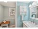 Bright bathroom with marble countertop, white cabinets, and a separate shower space at 4553 Pond Ln, Marietta, GA 30062