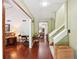 Warm and inviting foyer with hardwood floors and view into multiple rooms at 4553 Pond Ln, Marietta, GA 30062