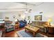 Spacious living room with vaulted ceilings, stone fireplace and hardwood flooring at 4553 Pond Ln, Marietta, GA 30062