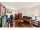 Living room features hardwood floors, a comfortable futon, and ample space for relaxation at 4553 Pond Ln, Marietta, GA 30062