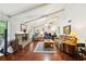 Cozy living room features a stone fireplace, wood flooring, and ample seating at 4553 Pond Ln, Marietta, GA 30062