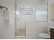 Bathroom featuring glass shower, marble tile, and modern fixtures at 504 Rankin Ne St # 4, Atlanta, GA 30308