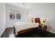 Cozy bedroom with hardwood floors, natural light, and a stylish accent table at 504 Rankin Ne St # 4, Atlanta, GA 30308