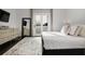 Cozy bedroom with a large bed, dresser, and sliding glass doors to an outdoor balcony at 504 Rankin Ne St # 4, Atlanta, GA 30308