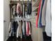 Walk-in closet with custom shelving and ample storage space for clothing and accessories at 504 Rankin Ne St # 4, Atlanta, GA 30308