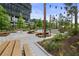 Community park featuring picnic tables, string lights, and lush landscaping at 504 Rankin Ne St # 4, Atlanta, GA 30308