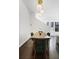 Contemporary dining area with dark wood floors, modern lighting, and seating for four at 504 Rankin Ne St # 4, Atlanta, GA 30308