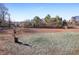 Large dog park surrounded by wood fencing with grassy area and mulch at 504 Rankin Ne St # 4, Atlanta, GA 30308