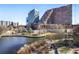 Stunning view of buildings, including unique architectural design, and a tranquil park with lake at 504 Rankin Ne St # 4, Atlanta, GA 30308