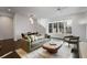 Bright living space with dark wood floors, modern furniture, and abundant natural light at 504 Rankin Ne St # 4, Atlanta, GA 30308