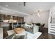 Open-concept living room showcases a modern kitchen and dining area in a well-lit space at 504 Rankin Ne St # 4, Atlanta, GA 30308