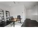 Bright office space with dark floors, ladder shelving, and an adjustable wooden desk at 504 Rankin Ne St # 4, Atlanta, GA 30308