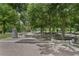 Beautiful park walkway with shaded trees, benches, and trash receptacles in the vicinity at 504 Rankin Ne St # 4, Atlanta, GA 30308