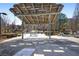 Park pavilion structure with bench seating surrounded by foliage and hardscape at 504 Rankin Ne St # 4, Atlanta, GA 30308