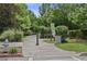 Scenic view of landscaped walking path featuring mature trees, greenery, and manicured bushes at 504 Rankin Ne St # 4, Atlanta, GA 30308