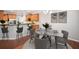 Eat-in kitchen featuring granite countertops, stainless steel appliances, and a cozy breakfast bar at 5317 Concordia Se Pl # 10, Mableton, GA 30126