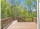 Inviting back deck overlooking a lush, wooded area, perfect for outdoor enjoyment at 5382 Pebblebrook Se Ln, Mableton, GA 30126