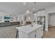 Spacious kitchen with modern appliances flowing to living and dining area at 5382 Pebblebrook Se Ln, Mableton, GA 30126