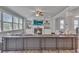 Cozy living room with a fireplace, built-in shelves, and a comfortable seating area at 5382 Pebblebrook Se Ln, Mableton, GA 30126
