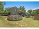 Spacious backyard with above-ground pool, deck, and ample space for outdoor activities at 126 Amberwood Ln, Euharlee, GA 30145