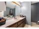 Bathroom vanity with white countertop, basin sink, and decorative accents at 126 Amberwood Ln, Euharlee, GA 30145