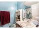 Bathroom with white fixtures, vanity and tiled floor at 126 Amberwood Ln, Euharlee, GA 30145