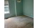 Bedroom with green walls and a ceiling fan and window at 126 Amberwood Ln, Euharlee, GA 30145