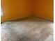 Bedroom with bright orange walls, carpet and a window at 126 Amberwood Ln, Euharlee, GA 30145