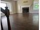 Living room showcases a fireplace and hardwood floors at 126 Amberwood Ln, Euharlee, GA 30145