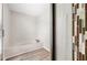 Bathroom featuring tile floors, soaking tub and a modern glass enclosed shower with tile accents at 3 S Riversong Ln, Alpharetta, GA 30022