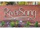 Riversong brick sign surrounded by greenery at 3 S Riversong Ln, Alpharetta, GA 30022