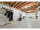 Unfinished basement, with exposed ceiling, ready to be converted to a play area or work out area at 45 Harvey Ave, Covington, GA 30016