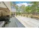 Spacious wooden deck overlooking the backyard, ideal for outdoor relaxation and enjoyment at 45 Harvey Ave, Covington, GA 30016