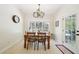 Cozy dining area with outdoor access and views of the deck at 45 Harvey Ave, Covington, GA 30016