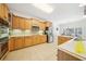Bright kitchen with stainless appliances, tile backsplash, and tile flooring at 45 Harvey Ave, Covington, GA 30016