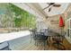 Outdoor patio with dining set and grill, perfect for al fresco dining and enjoying backyard views at 45 Harvey Ave, Covington, GA 30016