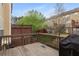 Exterior view of a charming wooden back deck with a fence, perfect for outdoor gatherings at 4880 Payson Se Ter, Atlanta, GA 30339