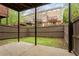 Small backyard with a concrete patio, wood fence, and green grass at 4880 Payson Se Ter, Atlanta, GA 30339