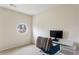 Neutral home office with a modern desk and round window at 4880 Payson Se Ter, Atlanta, GA 30339