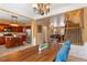 Traditional dining room connected to the kitchen with table, chairs, and staircase at 4880 Payson Se Ter, Atlanta, GA 30339