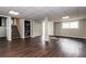 Basement with hardwood floors, staircase, and storage at 6497 King William Dr, Morrow, GA 30260