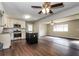 Modern kitchen with granite countertops, stainless steel appliances, and a dark island at 6497 King William Dr, Morrow, GA 30260