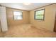Inviting bedroom with bright walls, carpet flooring, and natural light, perfect for relaxation and rest at 125 Valley View Ct, Tyrone, GA 30290