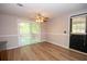 Open dining area with lots of natural light, and deck access at 125 Valley View Ct, Tyrone, GA 30290