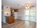 Dining area adjacent to kitchen, featuring sliding doors leading to back deck at 125 Valley View Ct, Tyrone, GA 30290