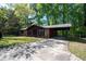 Attractive home with a brick facade, carport, and verdant lawn at 125 Valley View Ct, Tyrone, GA 30290