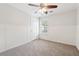 Bedroom featuring neutral walls and carpet, window and ample closet space at 1433 Chardin Dr, Marietta, GA 30062