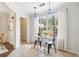 Bright breakfast nook with tile flooring, a window, and seating for two at 1433 Chardin Dr, Marietta, GA 30062