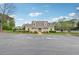 Community clubhouse with ample parking and well-maintained landscaping, a central gathering space at 1433 Chardin Dr, Marietta, GA 30062